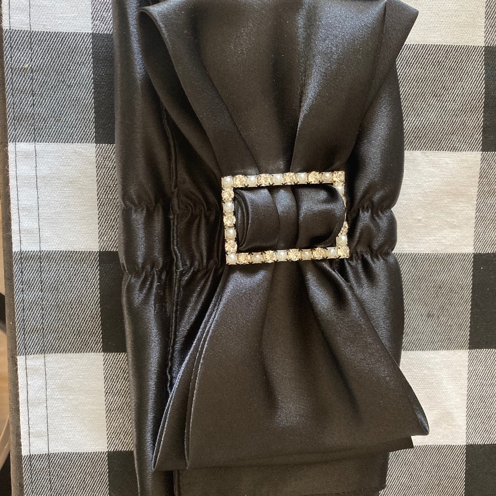 Black bow clutch